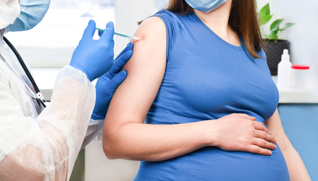 Pregnant woman receiving COVID-19 vaccine